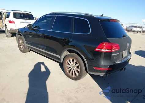 2012 Volkswagen Touareg Tdi Lux z USA, uszkodzony, nr VIN WVGFK9BPXCD002754